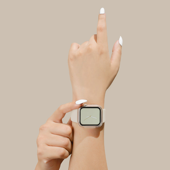 Clear silicone Apple Watch case by Coconut Lane on wrist, one hand pointing upward and touching the watch.
