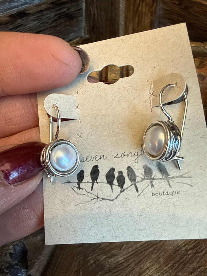 Freshwater pearl drop earrings with silver-tone round settings and hinged hooks