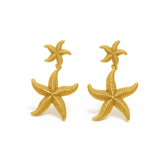 Gold-tone starfish drop earrings with a textured finish from Coconut Lane.