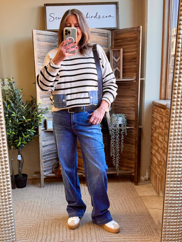 Striped denim-pocket mock-neck sweater in cream and black knit with long sleeves