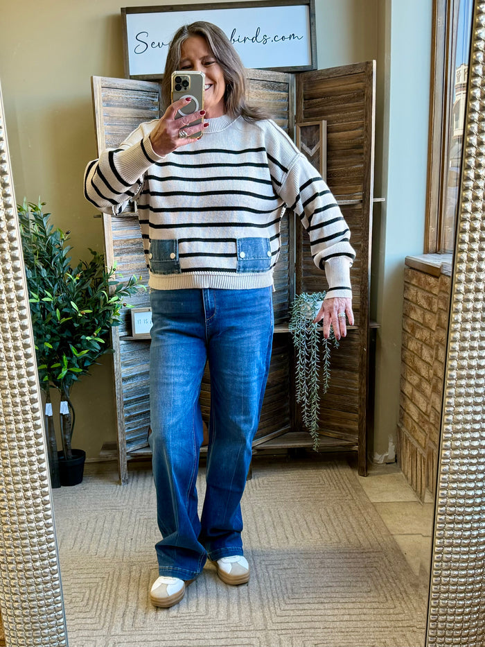 Striped mock-neck knit sweater with denim-style chest pocket and long sleeves
