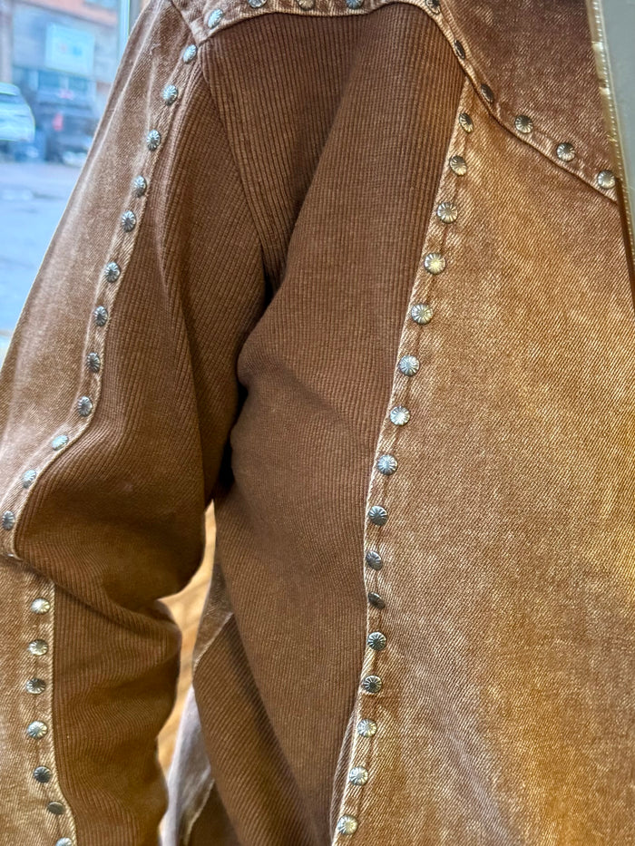 Brown 1/4-zip sweatshirt detail: studded trim along the front seam and collar