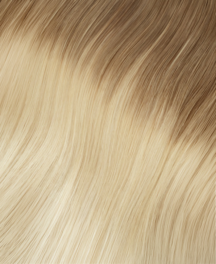 tape-in hair extensions shadow root white blonde.