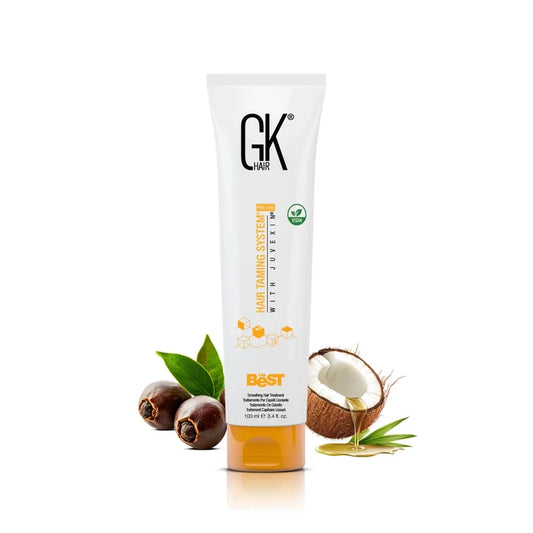 GK Hair The Best Hair Treatment 100ml Surrounded by Coconut and nut with a white background