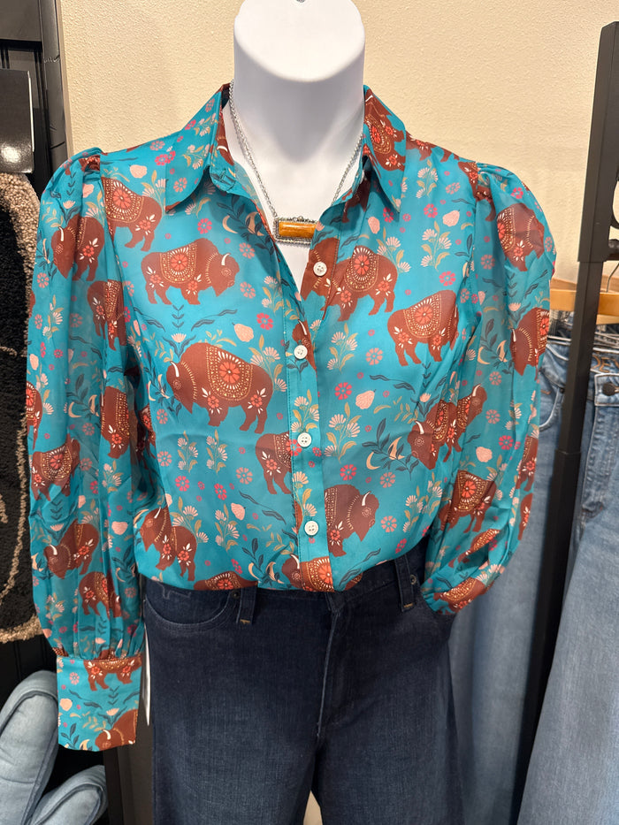 Turquoise semi-sheer blouse with button-front and colorful elephant print