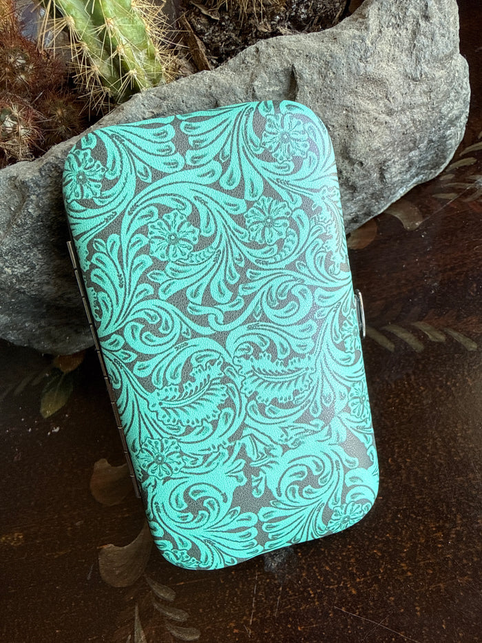 Turquoise patterned manicure set case with stamped floral design