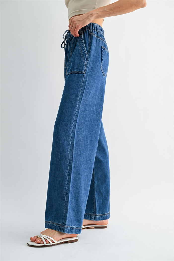 Mica wide-leg tie-waist jeans in blue denim, side view with drawstring at waistband